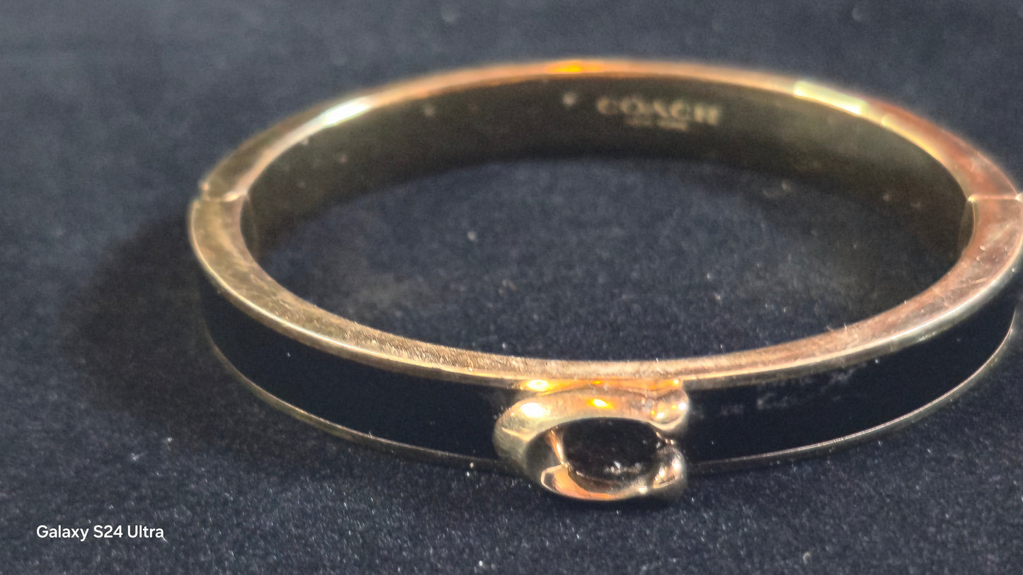Coach Black Enameled Hinged Bangle Gold Plated Brass Black Enamel Side Clasp