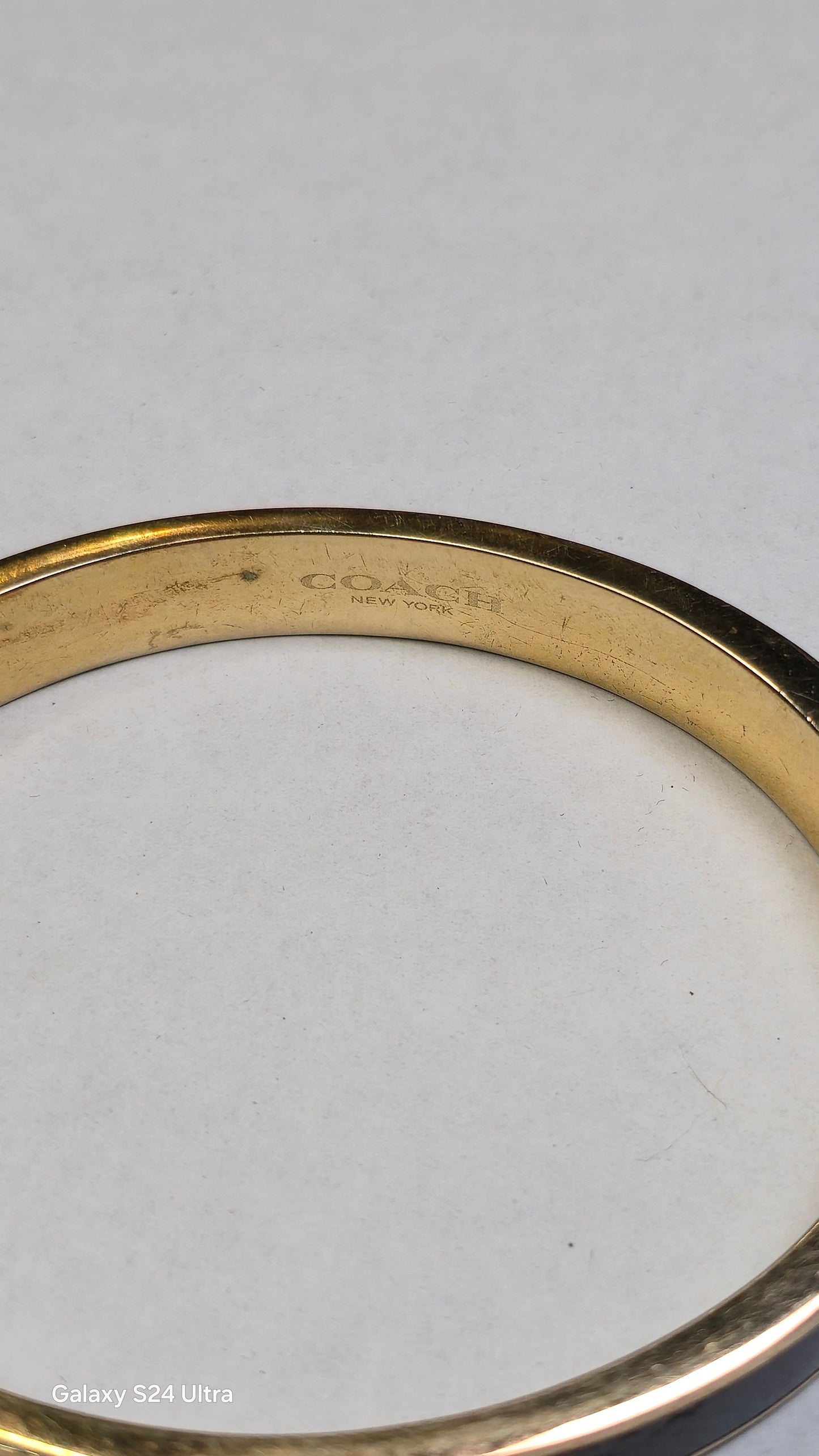 Coach Black Enameled Hinged Bangle Gold Plated Brass Black Enamel Side Clasp